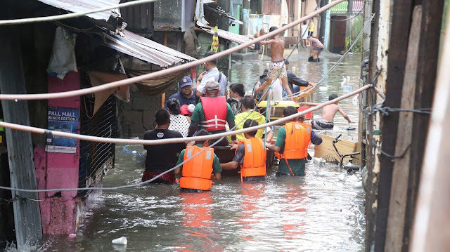 The Pasig River Rehabilitation Commission (PRRC) Rescued Families During the Typhoon Henry Floods