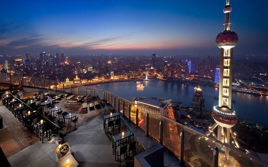 The World’s 30 Best Rooftop Bars… Everyone Should Drink At #9 At Least Once. - The 58th floor view in the Ritz-Carlton Shanghai in China.