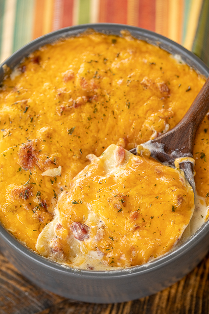 Instant Pot Scalloped Crack Potatoes - potatoes loaded with cheddar, bacon and ranch. So simple and they taste amazing! Everyone LOVES these cheesy potatoes. Thinly sliced potatoes, heavy cream, milk, ranch seasoning, cheddar cheese and bacon. Great with chicken, pork, steak and burgers! SO good! #instantpot #potatoes #bacon Instant Pot Scalloped Crack Potatoes - potatoes loaded with cheddar, bacon and ranch. So simple and they taste amazing! Everyone LOVES these cheesy potatoes. Thinly sliced potatoes, heavy cream, milk, ranch seasoning, cheddar cheese and bacon. Great with chicken, pork, steak and burgers! SO good! #instantpot #potatoes #bacon