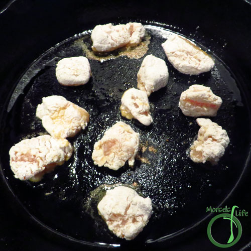 Morsels of Life - Sesame Chicken Step 3 - Pan fry the breaded chicken chunks in a bit of oil until crispy and cooked through.