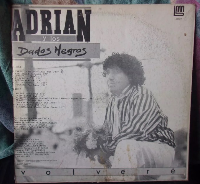 adrian y los dados negros volvere caratura trasera