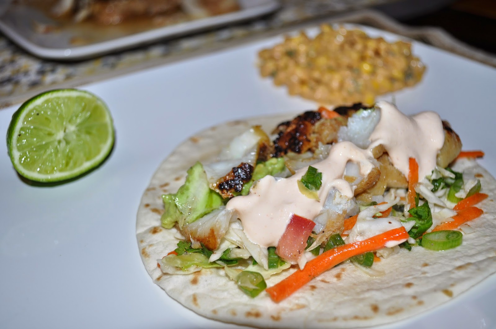 Carri Us Home Fish Tacos with Spicy Sriracha Sour Cream