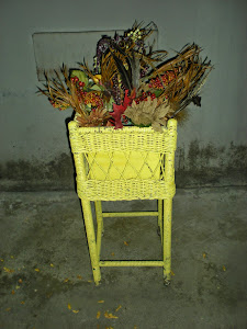 Yellow Wicker Planter with Flowers