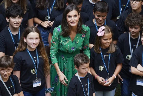 Queen Letizia wore a flower print asymmetric silk midi dress by Maje Paris. International School of Music of Princess of Asturias Foundation