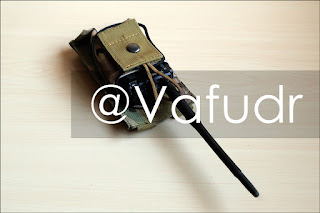 Adjustable Tactical Camo Radio Pouch with Yeasu Radio in it