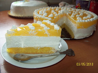 Tort cu nuca de cocos, branza si jeleu de portocale