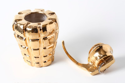 gold grenade vase