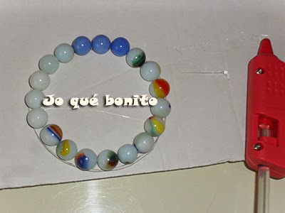 Portavelas con canicas