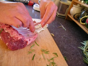 Wrap each rib/bone end or the rack of lamb with tin foil to avoid burn