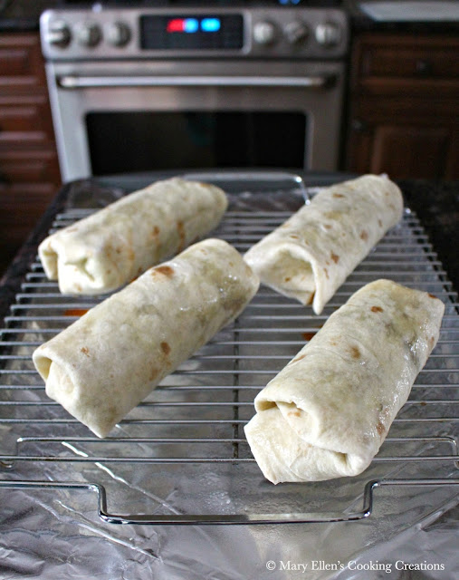 Oven Baked Beef and Bean Burritos for a weeknight or celebration. Great dinner for Cinco de Mayo! Ground beef, beans, salsa, and toppings in crispy, oven-baked burritos. 