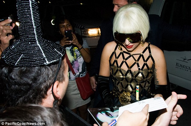Lady+Gaga+in+Versace+arrives+in+SA.jpeg