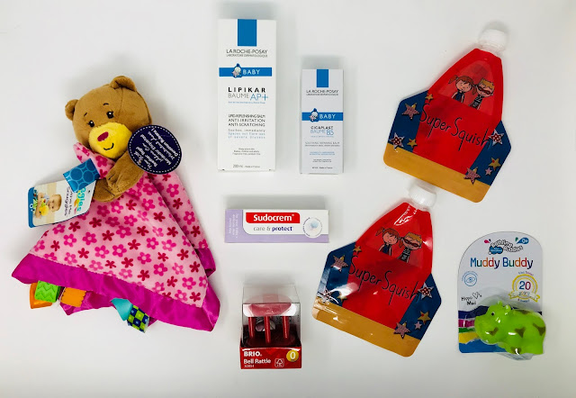 La Roche-Posay Baby Soothing Repair Balm, La Roche-Posay Baby Lipid Replenishing Balm, Sudocrem care & protect nappy rash cream, Bathtime Buddies Hippo bath toy, Brio Bell Rattle, Super Squish Reusable Food Pouch x 2, Taggies Sooth Me Snuggles Bear Pink 