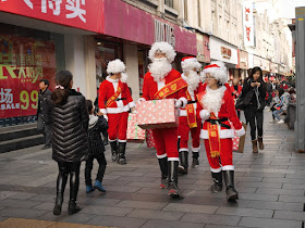 even more people dressed up as Santa