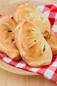 These cheesy and savory spinach ricotta calzones are so delicious and the perfect meatless meal! 