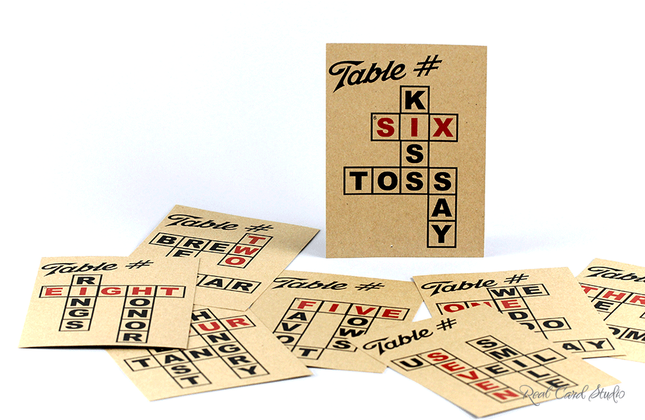 Crossword puzzle themed table signs for wedding breakfast reception by Real Card Studio Crossword puzzle themed table signs for wedding breakfast reception by Real Card Studio