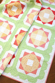 Sunny Day quilt pattern from the Fresh Fat Quarter Quilts book by Andy Knowlton of A Bright Corner - uses 12 fat quarters and has a fun scallop border