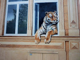 Rostock, graffiti foarte realistic reprezentand un tigru la o fereastra