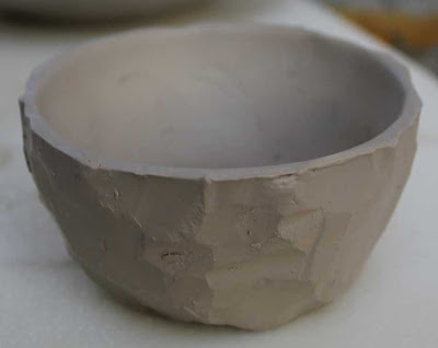 wet carved pottery bowl