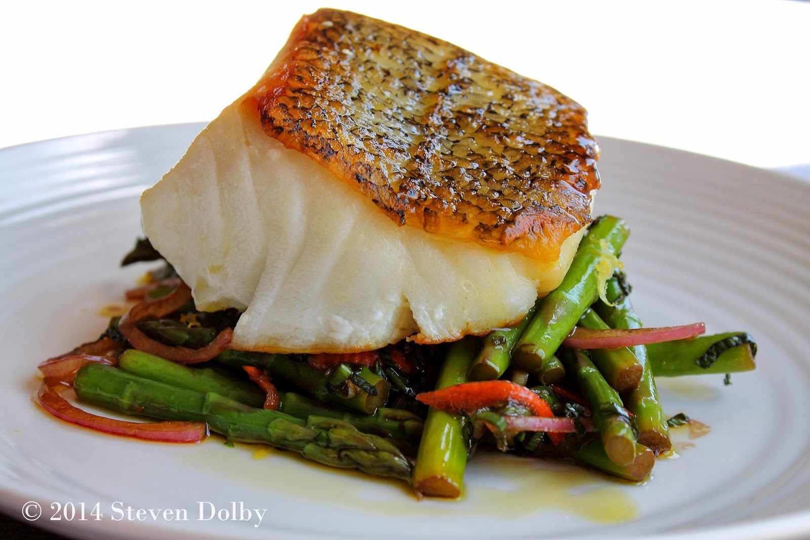 Pan Roasted Sea Bass Served With Asparagus And Mint Salad By Steven Dolby
