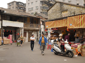 people walking on Baisha Road in Jiangmen