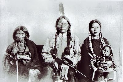 Indians sitting around Fire