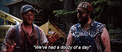 Tucker and Dale, covered in blood, cautiously telling the sheriff (off-screen) that they have had a doozy of a day
