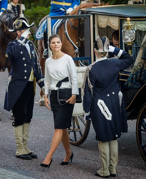 Sweden's Crown Princess Victoria and Prince Daniel (R) arrive to attend the opening of the Swedish parliament in Stockholm 