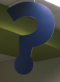 Question mark sign question mark sign over the info desk at KP