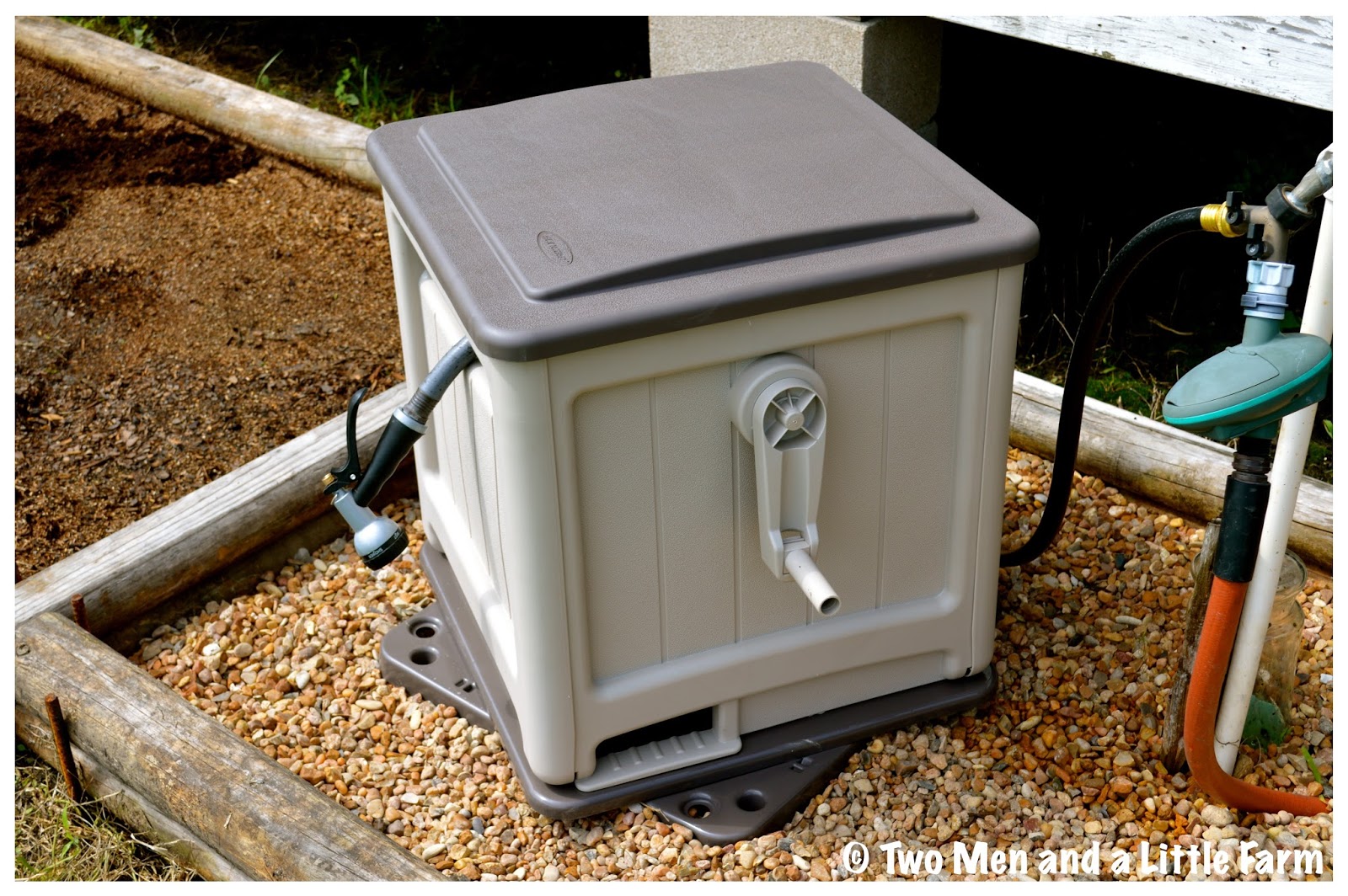 Two Men and a Little Farm HOSE REEL HIDEAWAY FLOWERBED