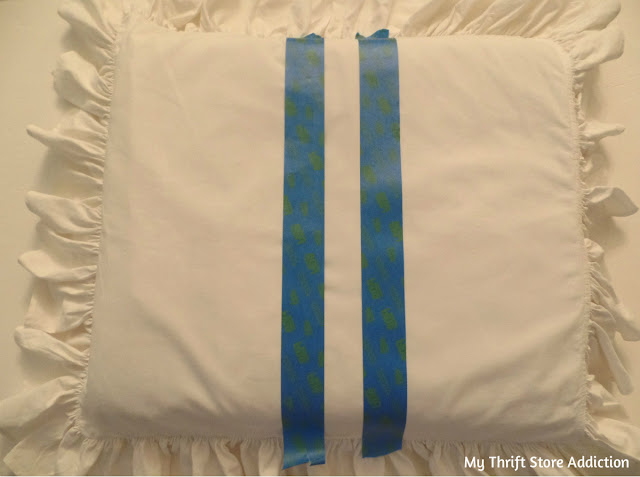 Use painter's tape to create a DIY grain sack stripe on a cushion cover! DIY short girl footstool with grain sack stripe cushion