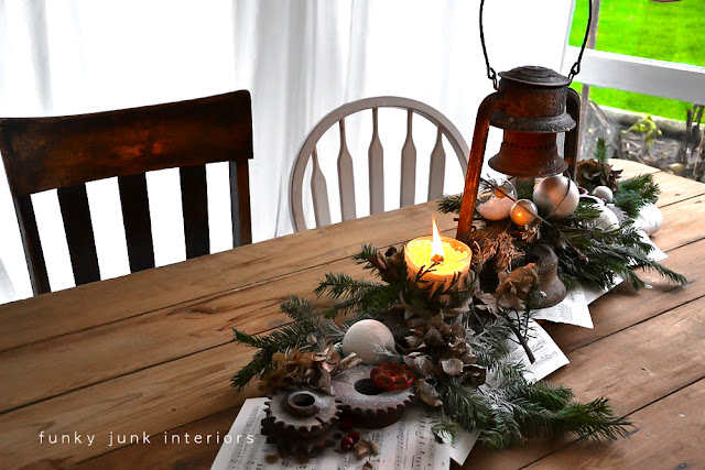 A rusty lantern and gear junk Christmas centrepiece - by Funky Junk Interiors A rusty lantern and gear junk Christmas centrepiece - by Funky Junk Interiors