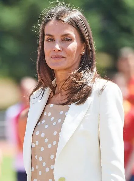 Queen Letizia wore a new blazer and trouser, suit by Carolina Herrera. Queen wore a new polka dot camel blouse by Carolina Herrera