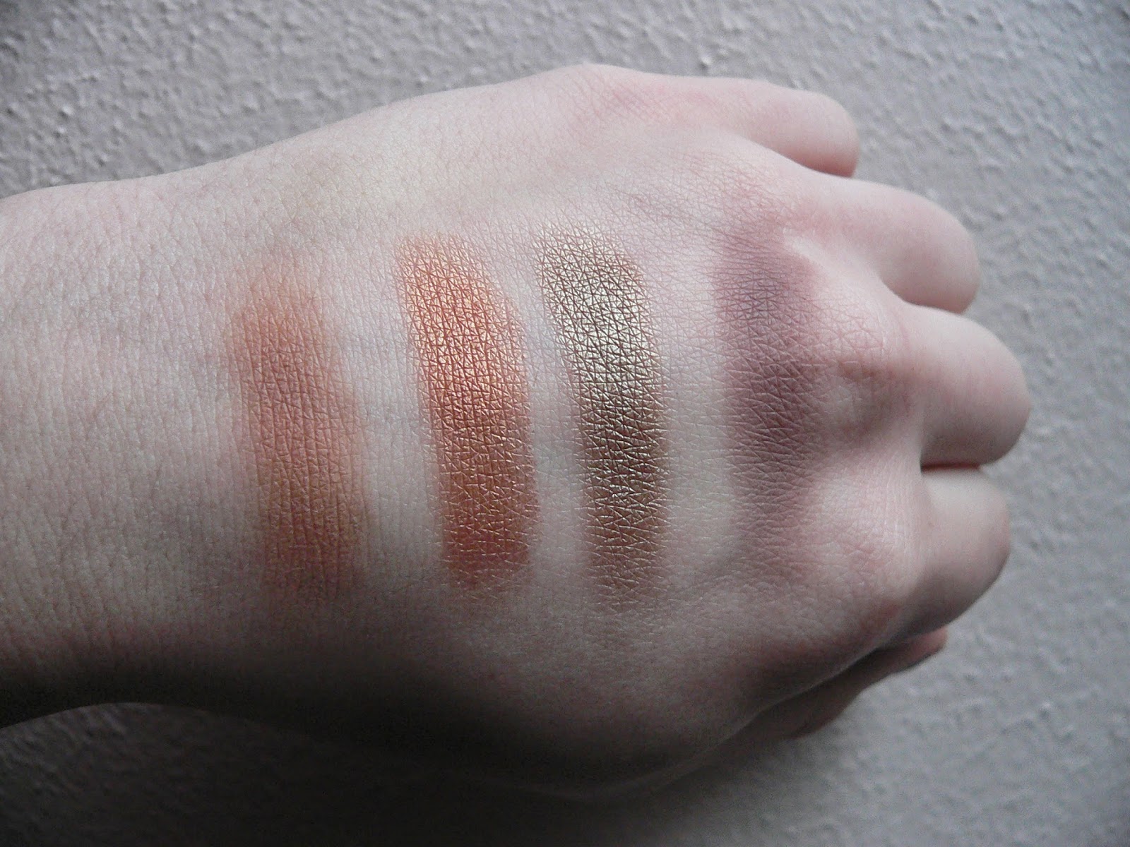 MAC Eye Shadow Swatches: (Left to Right) "Bamboo", "Amber Lights", "Sumptuous Olive", "Quarry"