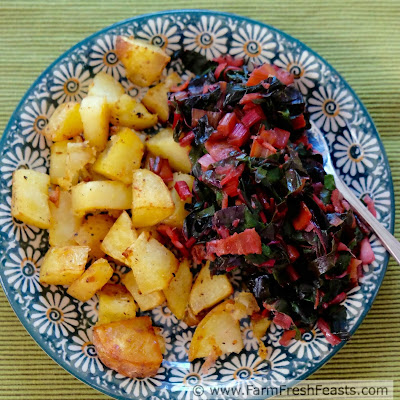 Fill your plate with vegetables--this dish consists of a heaping helping of sautéed Swiss chard and a side of roasted potatoes. A bit of bacon for flavor and you're ready to eat.