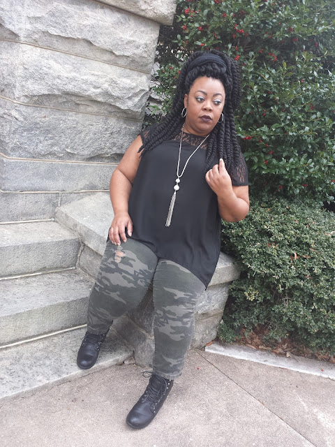 Plus size blogger wearing glam army fatigue and Havana Mambo twists.