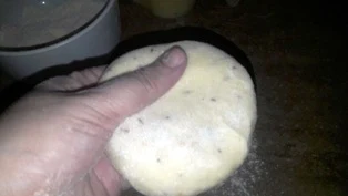 flatten-the-dough-ball-between-your-palm