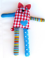http://sewtoy.com/free-toy-sewing-pattern/how-to-sew-carefree-cat-from-scraps-free-pattern/