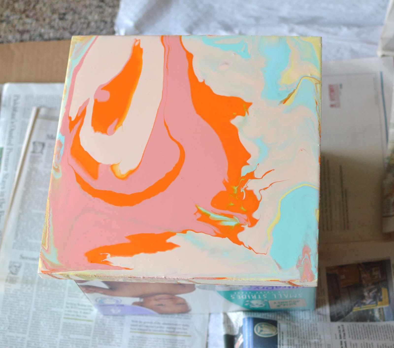 Vikalpah How to paint pour using acrylic paint and Mod Podge on wood panel