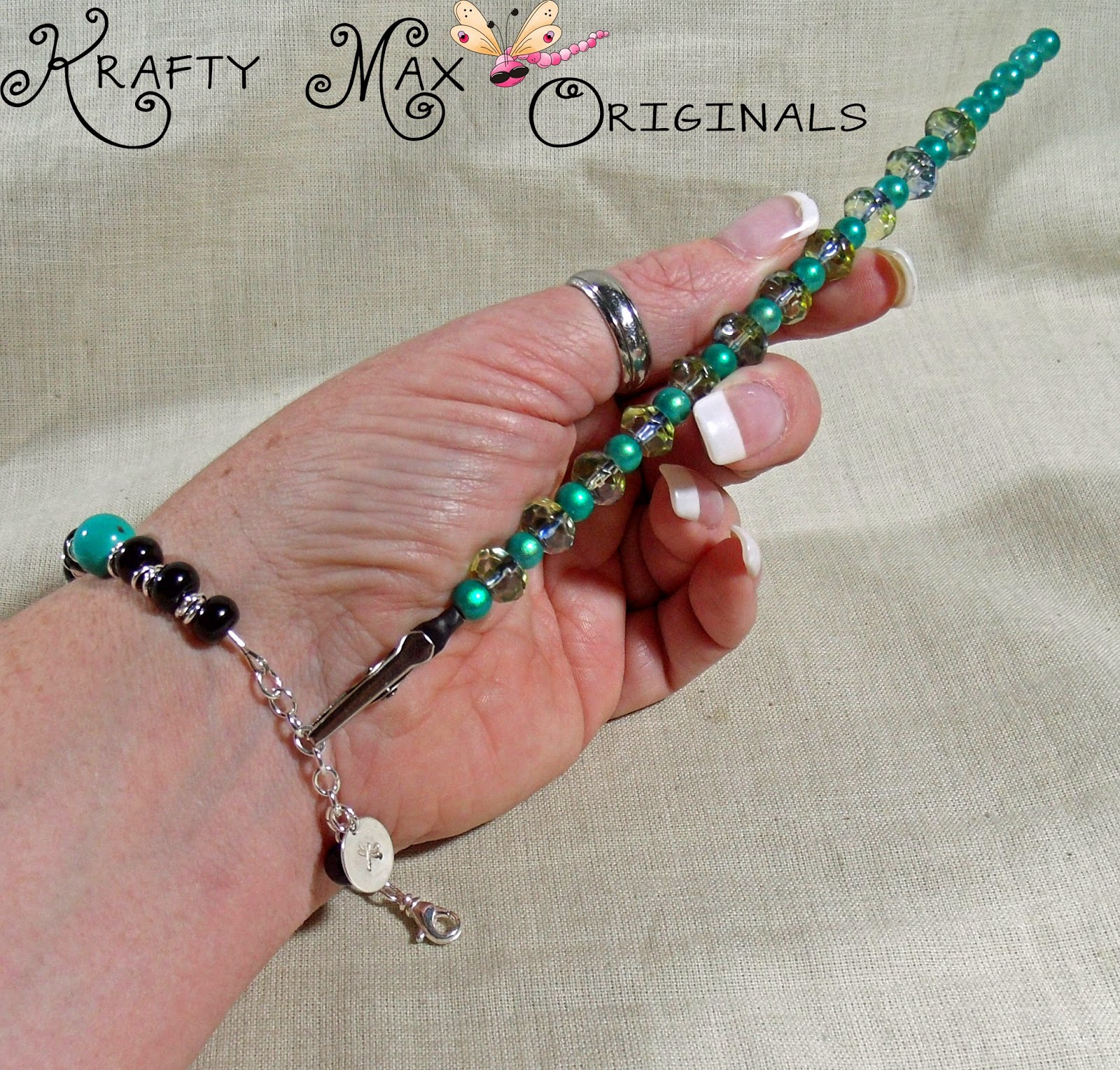 http://www.artfire.com/ext/shop/product_view/KraftyMax/10017611/green_miracle_beads_-_no_husband_needed_klasp_helper/handmade/accessories