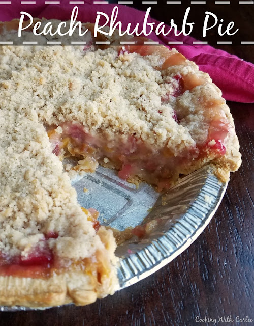 Peach rhubarb pie combines the tart taste of spring with summer's sweet fruit. Peach and rhubarb come together under a golden streusel in this perfect fruity pie.