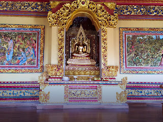 Gold Buddha Wall Sculpture and Relief In The Worship Room Brahmavihara Arama Monastery North Bali