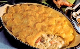 Classic Fish Pie: Traditional fish pie of smoked and white fish in a milk base topped with sliced potatoes and cheese