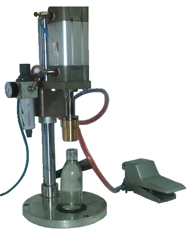 FILLING CAPPING LABELING MACHINES: Semi automatic snap on capping machine