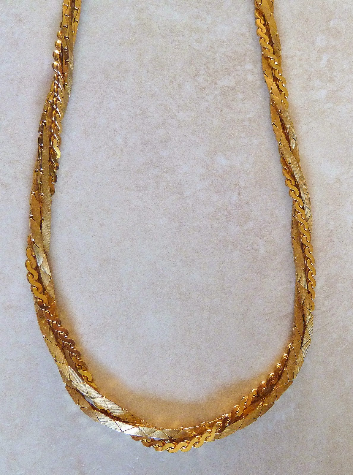 http://www.kcavintagegems.uk/vintage-twisted-three-strand--necklace-414-p.asp