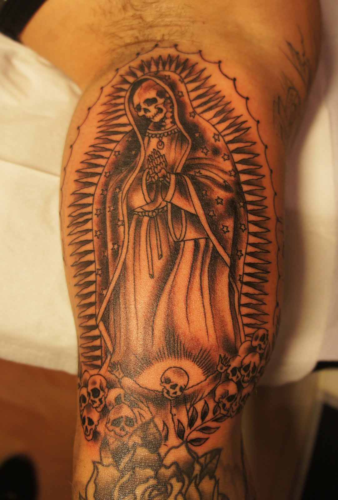 Death tattoos portrayals of the Santa Muerte TATTOO DESIGNS