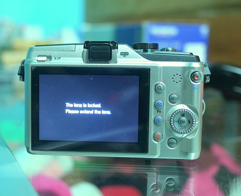 Masalah the lens is locked please extend the lens Zuiko 1442 Olympus