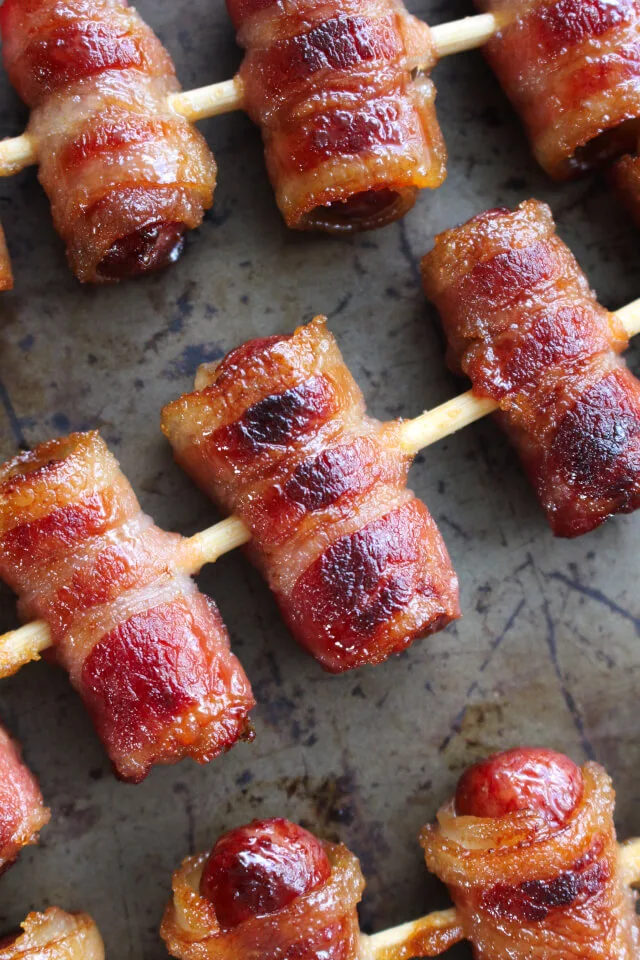 Brown Sugar Bacon Wrapped Smokies are a 3-ingredient appetizer that's always the first to disappear!  If you're making them for a party, I suggest a double batch.