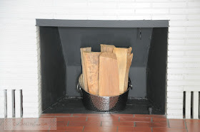 Insert in fireplace painted all black :: OrganizingMadeFun.com