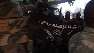 1a Photos: One of the flags seen in Boko Haram leader, Shekau's videos, reportedly recovered in Sambisa forest