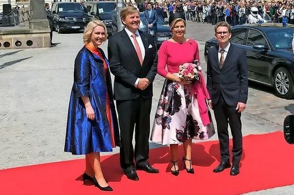 Queen Maxima wore NATAN floral skirt and pink top. Minister-President Manuela Schwesig and her husband Stefan in Schwerin